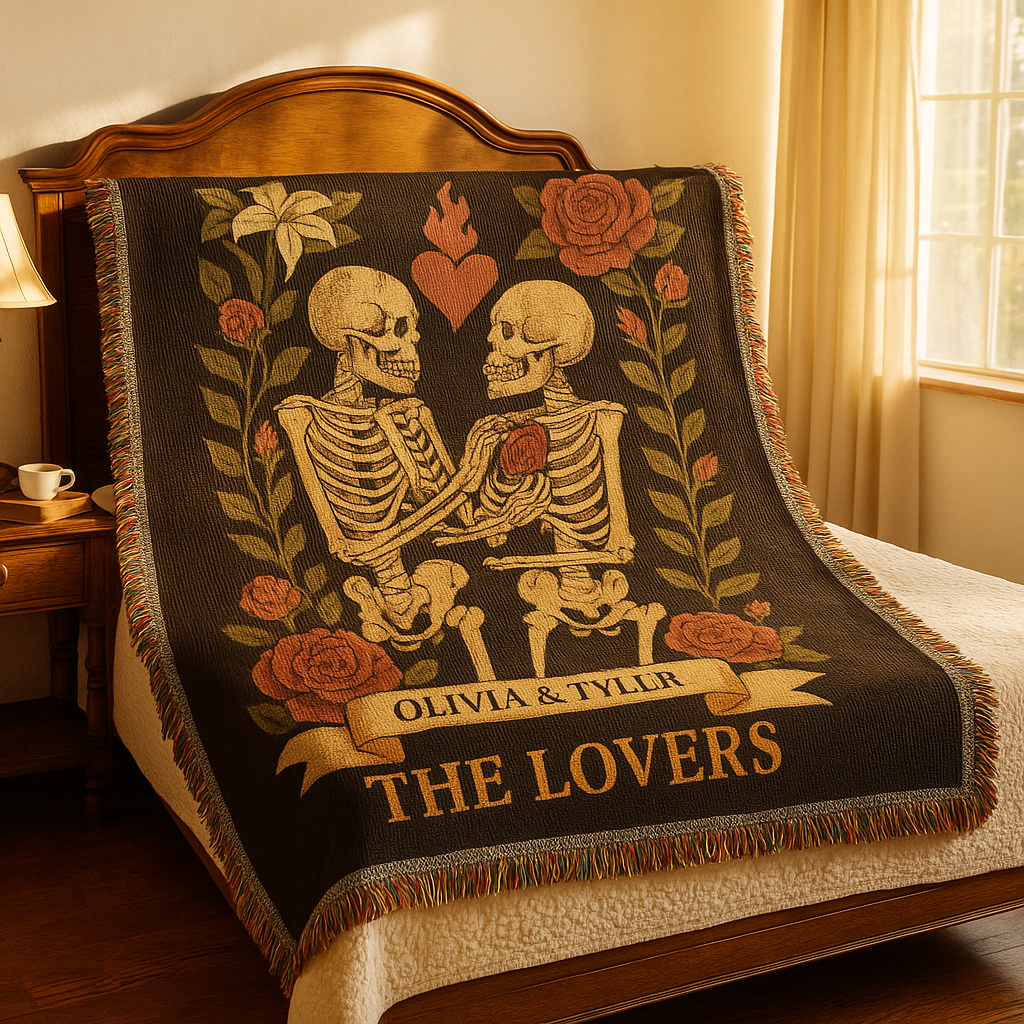 Blanket with skeletons and floral design on a bed in a bedroom setting
